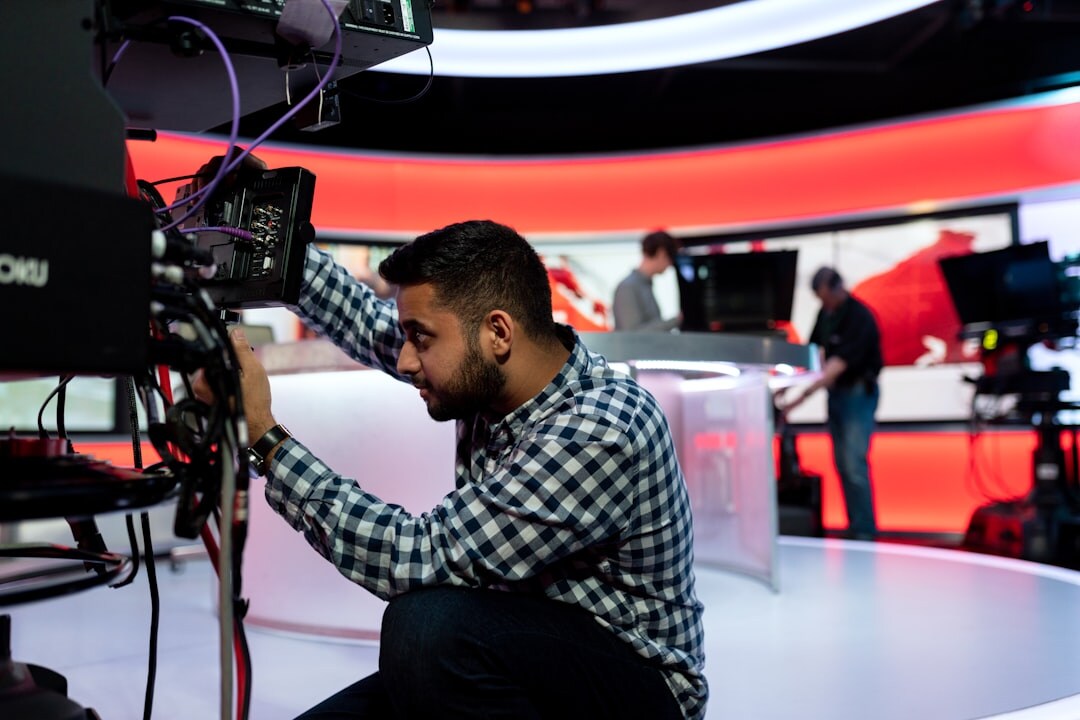 Modern broadcast technology equipment and production gear arranged in a professional media facility