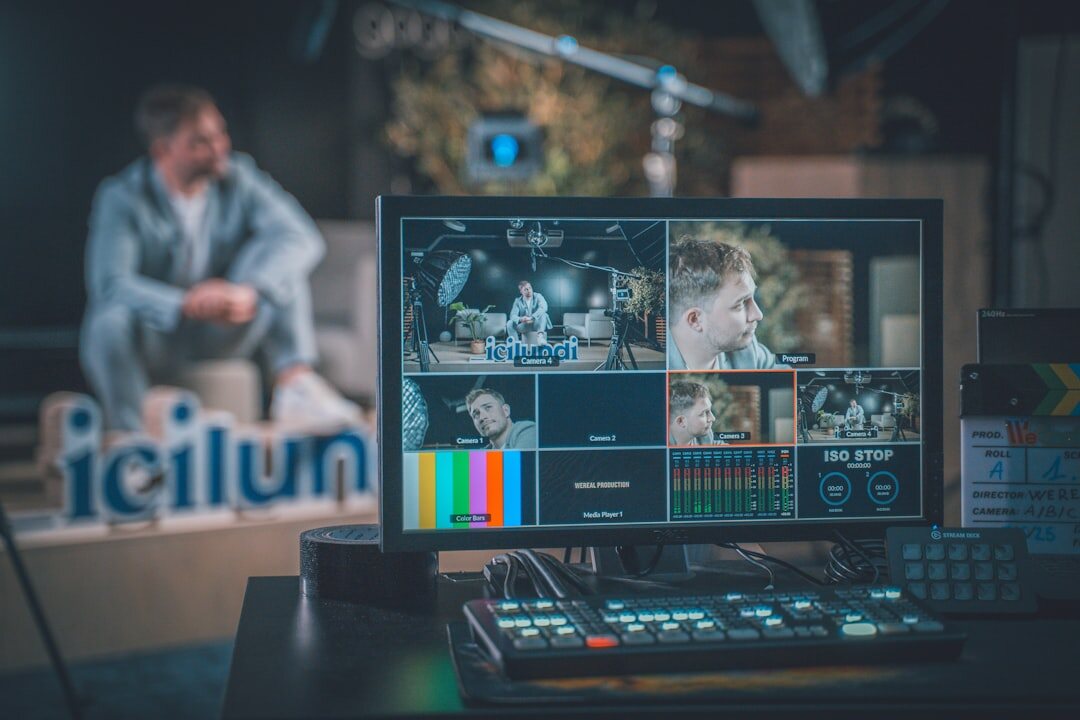 Modern TV studio interior with colorful stage lighting and camera positions